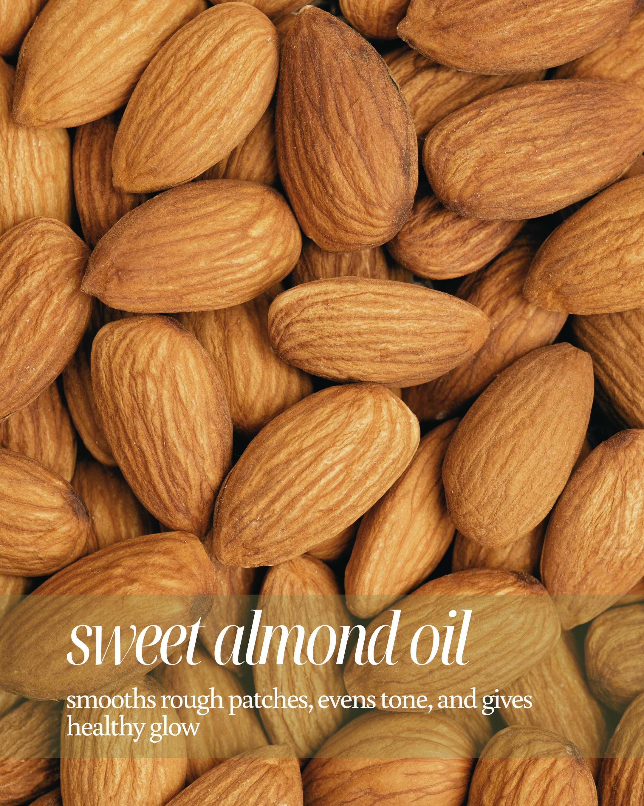 Close-up of almond used as a background for text highlighting sweet almond oil's skincare benefits, stating ‘smooths rough patches, evens tone, and gives healthy glow'