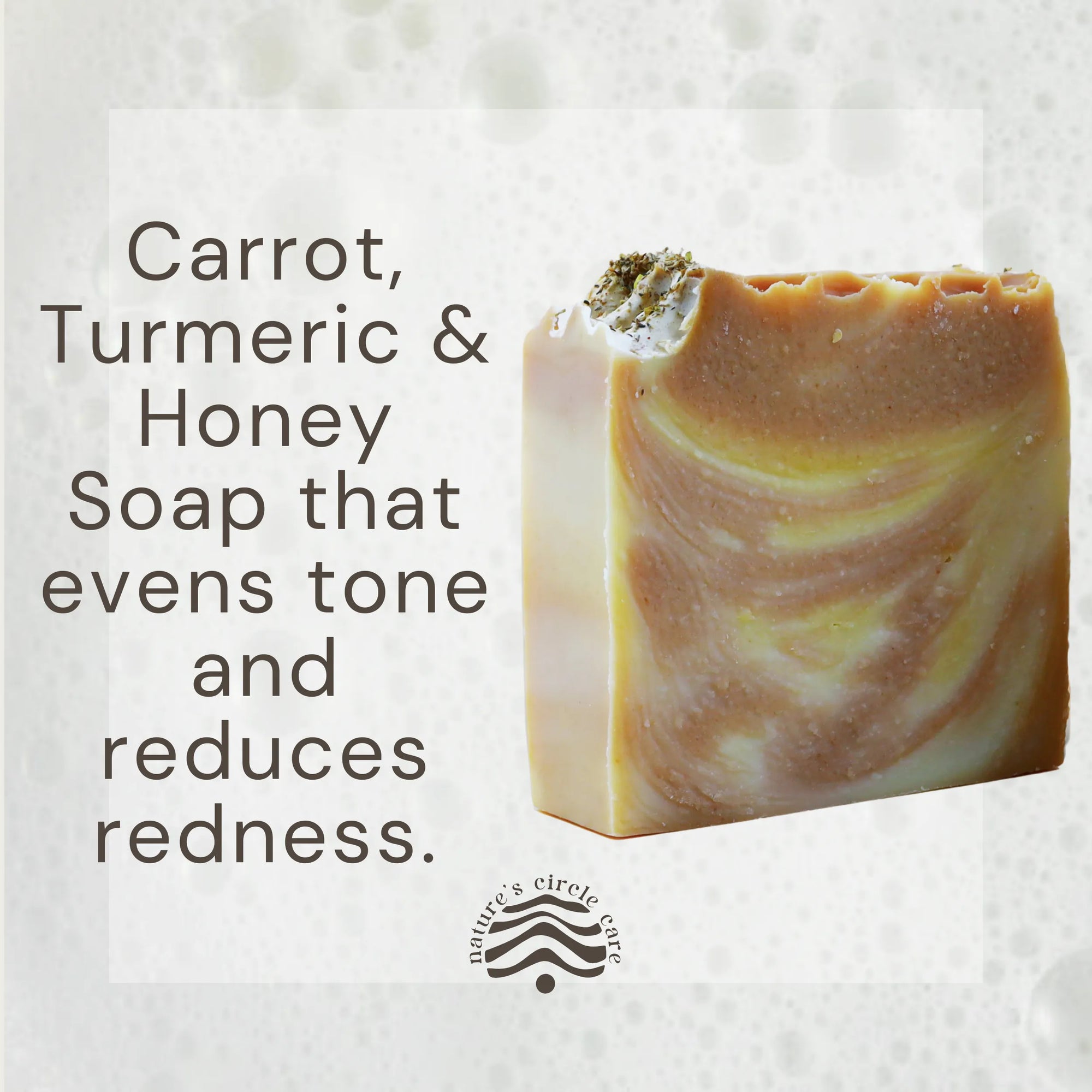 Nature's Circle Care's Amber Organic Soap, with it luxurious lather in the background. This carrort, turmeric, and honey soap evens skin stone and reduces redness.