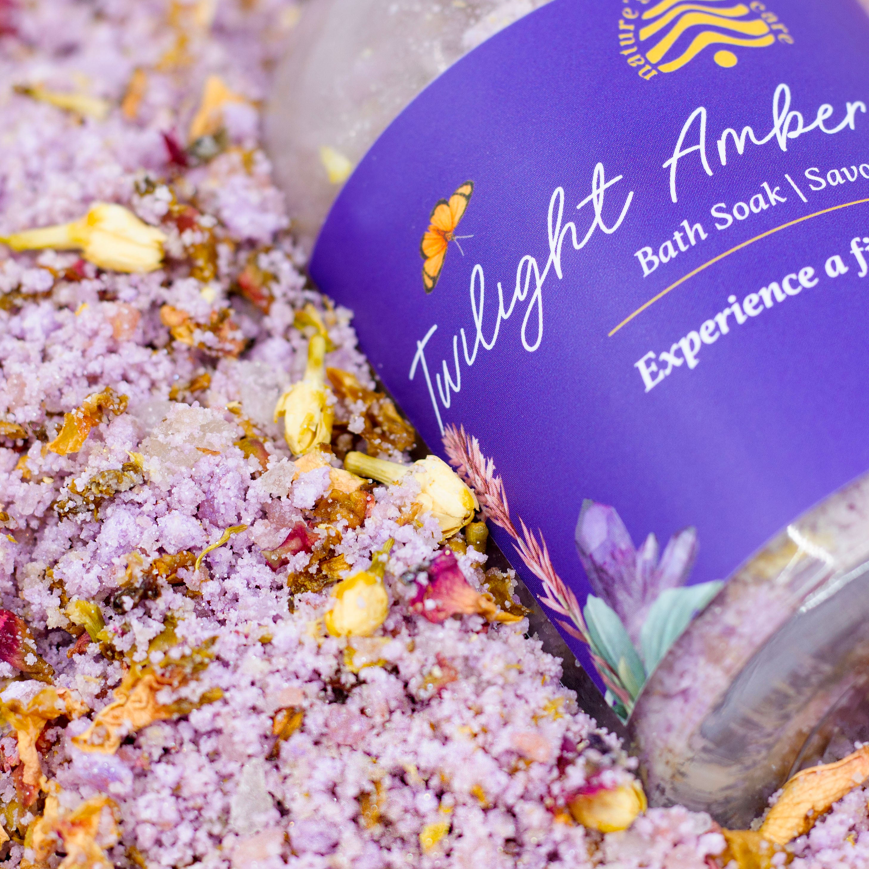 Relaxing bath salt that contains Dead Sea salt, pink sea salt, and orchid extract for a fizzy floral bath experience.