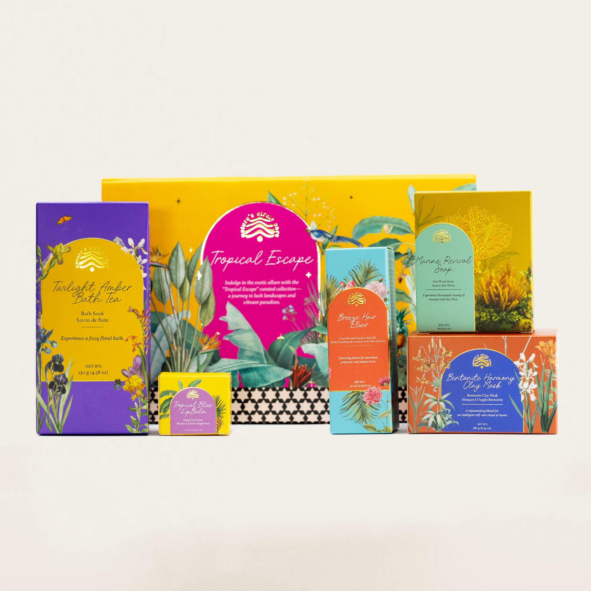 Premium Tropical Escape gift box, a curated collection of luxurious products including Tropical Bliss Lip Balm, Marine Revival Soap, Bentonite Harmony Clay Mask, Twilight Amber Bath Salt, and Breeze Hair Oil, designed to transport you to a lush, exotic oasis of wellness and luxury.