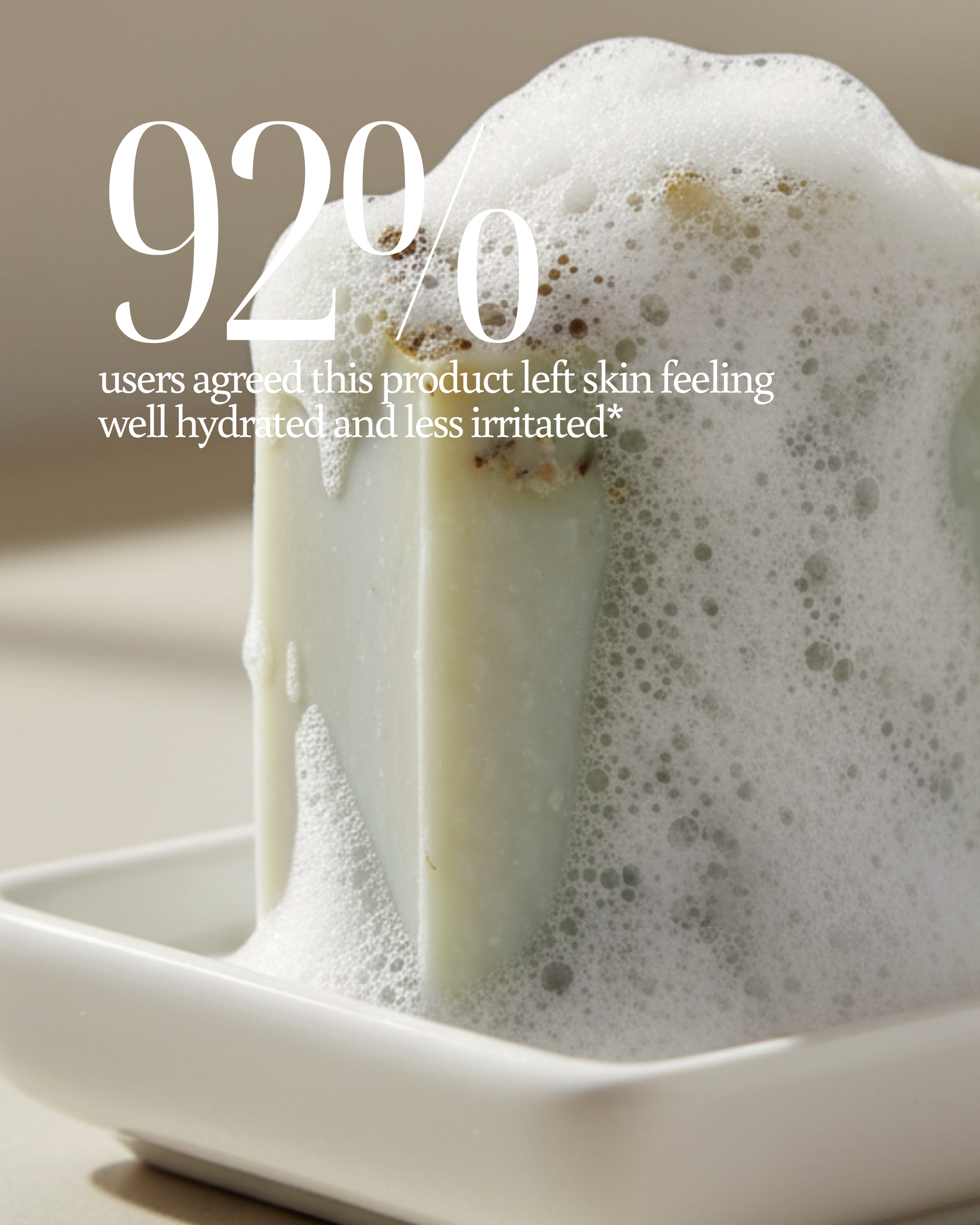 Foamy soap bar with a white dish on a neutral background, featuring text about user feedback saying "92% users agreed this product left skin feeling well hydrated and less irritated"