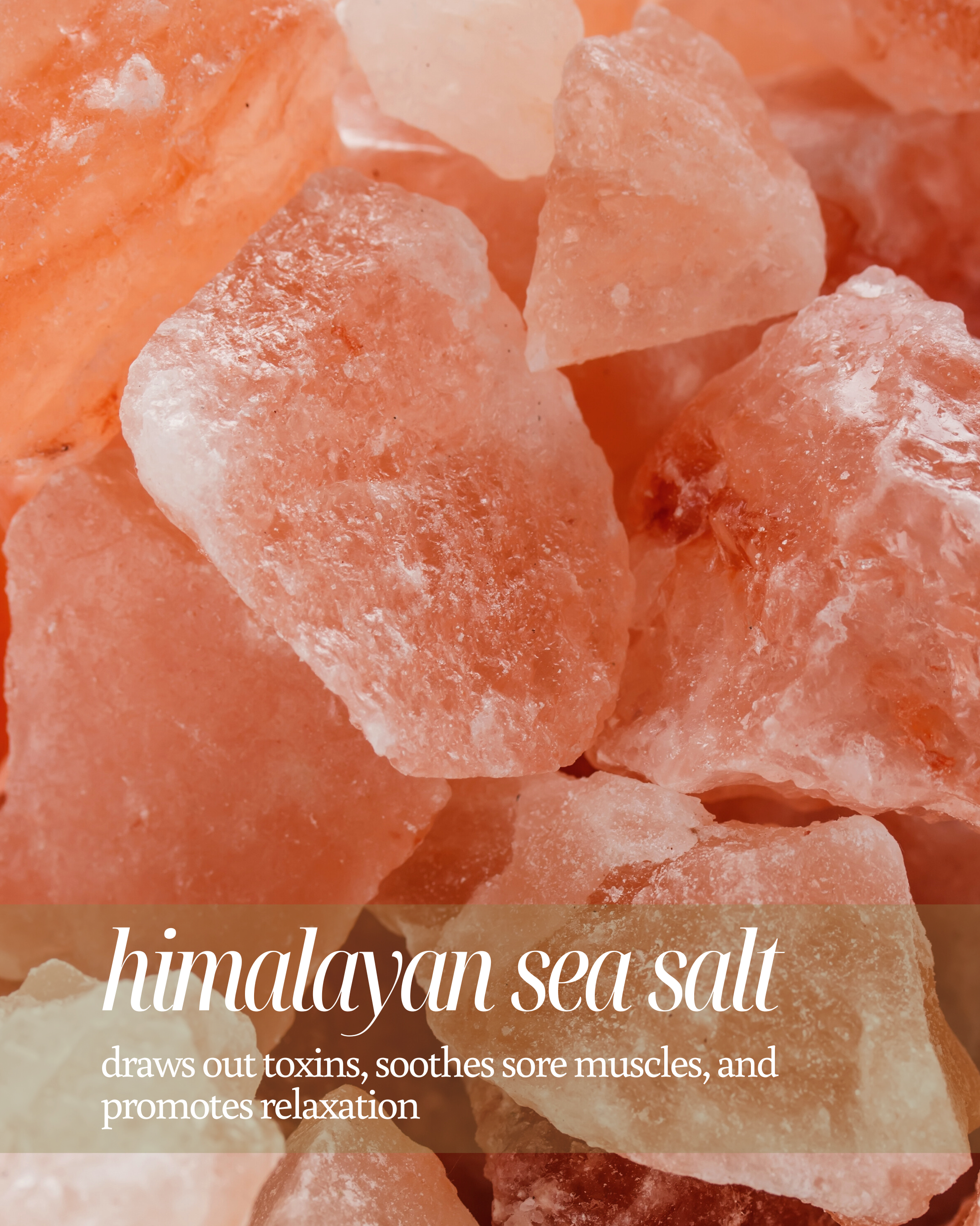 Close-up of pink Himalayan sea salt crystals with text about its benefits reading "draws out toxins, soothes sore muscles, and promotes relaxation"